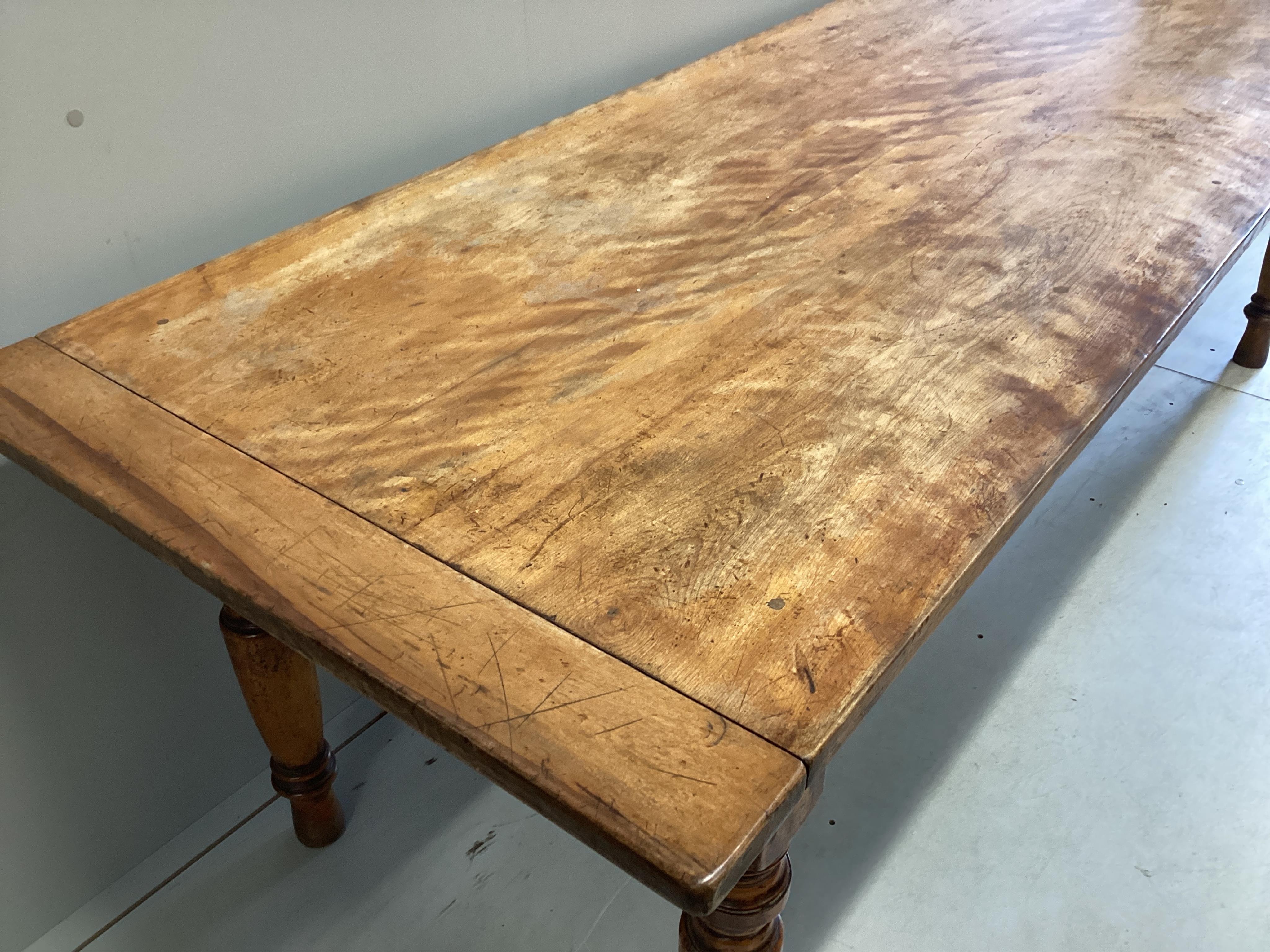 A 19th century rectangular birch kitchen table, width 233cm, depth 80cm, height 73cm. Condition - fair